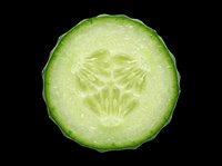 Fresh cucumber slice isolated on transparent background, ready for stickers, print on demand, T-shirt design, clipart, and sublimation projects.
