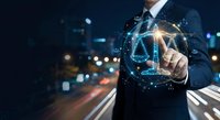 Businessman touching glowing AI hologram with digital network connections against blurred city lights background at night for technology concepts.