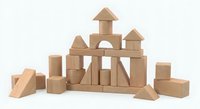 Wooden building blocks set arranged in castle structure on white background, natural wood toy blocks for children educational play and creativity development.
