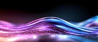 Abstract flowing waves with glowing particles in pink and blue colors against black background create dynamic motion effect for technology presentations.