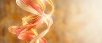 Abstract DNA double helix structure with golden and coral light effects on warm bokeh background for medical and scientific presentations.