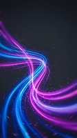 Abstract neon light trails in vibrant blue and pink colors creating dynamic swirling motion against dark background with glowing particles and energy waves.