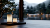 Glowing white candles on wooden table against snowy winter landscape with bokeh lights create cozy evening atmosphere for holiday and home decor.