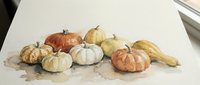 Watercolor autumn pumpkins and gourds arrangement in warm orange yellow tones on textured paper background for seasonal harvest thanksgiving decor.