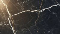 Elegant black marble surface with dramatic white and gold veining patterns creating luxurious natural stone texture for interior design and architectural applications.