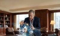 Senior Caucasian businessman in suit interacting with futuristic holographic technology display in luxury office environment for corporate innovation concepts.
