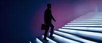 Businessman in dark suit carrying briefcase climbing illuminated staircase against purple gradient background, symbolizing career advancement and professional growth.