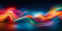 Vibrant multicolored flowing waves create dynamic motion against dark background, featuring smooth gradients of orange, blue, red and turquoise in abstract fluid pattern.