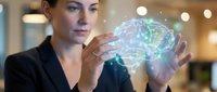 Professional businesswoman holding glowing digital brain hologram representing artificial intelligence, machine learning and innovative technology solutions.