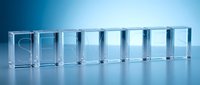 Transparent glass blocks arranged in a row spelling SERVICES on a blue gradient background, conveying clarity, trust, and corporate professionalism.