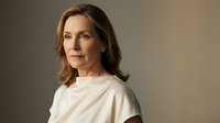Professional middle-aged Caucasian businesswoman in cream blouse with confident expression against neutral background for corporate presentations.