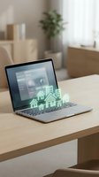 Modern laptop displaying digital real estate icons on wooden desk in bright home office workspace for property investment and online business applications.