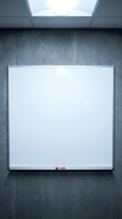Empty white presentation board mounted on concrete wall in modern office meeting room with natural skylight for business presentations and training sessions.