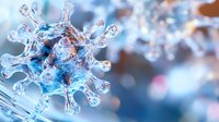 Microscopic view of virus cell structure in blue and silver tones showing detailed spikes and molecular surface on blurred scientific background.