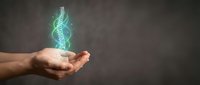 Hands holding glowing DNA double helix hologram representing genetic research, biotechnology innovation, medical science and healthcare technology concepts.