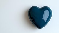 Glossy navy blue heart shape on white background with soft shadow, minimalist romantic symbol for love, relationships and emotional concepts.