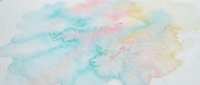 Soft watercolor paint strokes in pastel colors creating abstract artistic background with gentle blending effects on textured paper surface.