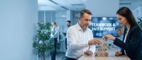 Middle-aged Caucasian businessman and young Hispanic businesswoman discussing teamwork strategy with icons in modern office environment for corporate presentations.