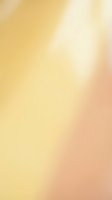 Soft gradient background transitioning from warm yellow to peachy pink tones, creating a gentle, blurred bokeh effect suitable for web design, presentations, and marketing materials.