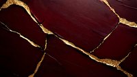 Dark burgundy cracked surface with golden kintsugi-style repairs creating an elegant abstract pattern against rich mahogany background. Luxury design element.
