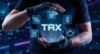 Businessman hands protecting holographic tax icons with percentage, calculator, dollar symbols on futuristic digital background for financial services.