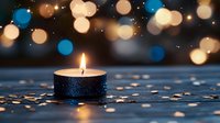 Single burning candle against dark background with blue and gold bokeh lights, creating peaceful atmosphere on reflective surface with scattered confetti.