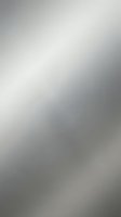 Soft gray gradient background with smooth transitions and subtle lighting effects for modern design projects and presentations.