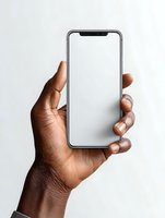 African American hand holding modern smartphone with blank white screen against minimalist background, perfect for app or website mockup.