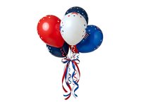 Red, white and blue balloons with patriotic ribbon bow isolated on white background, ready for holiday party decorations and celebrations.