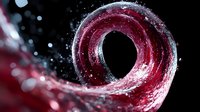 Dramatic red spiral wave with water droplets and bokeh effects on black background creates dynamic motion and abstract artistic composition for creative projects.
