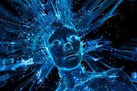 Glowing blue digital face emerging from dark background with light particles and energy rays, representing artificial intelligence and future technology.