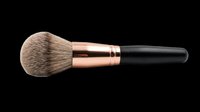 Makeup powder brush with rose gold ferrule and black handle, isolated on transparent background. Great for beauty clipart, stickers, t-shirt design, and print on demand.