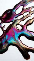 Iridescent metallic abstract form with flowing organic shapes and vibrant rainbow gradient coating, featuring magenta, cyan, and gold tones on white background for design projects.