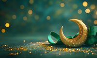 Golden crescent moon with emerald green ribbon and scattered glitter on dark background with bokeh lights, festive Ramadan or Eid celebration concept.