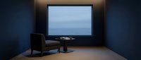 Minimalist room with dark blue walls, single armchair, and large screen displaying serene ocean horizon view for relaxation.