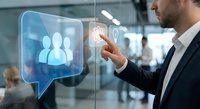 Professional businessman interacting with futuristic holographic interface displaying team management icons in modern office environment for digital transformation.