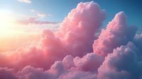Dramatic pink cumulus clouds illuminated by sunset light against deep blue sky, creating ethereal atmospheric scenery with soft gradient colors and dreamy mood.