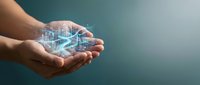 Hands holding glowing digital city hologram representing smart urban development, technology innovation, and sustainable infrastructure planning for business concepts.