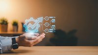 Business professional holding glowing digital checkmark with growth arrow and analytics icons, representing quality assurance, success metrics, and performance management for corporate solutions.