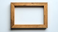 Rustic wooden picture frame with natural oak texture on white wall, empty space for artwork or photos. Clean minimalist design for home decor.
