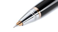 Elegant black ballpoint pen with chrome and gold accents isolated on white background for business writing and professional correspondence.