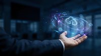 Businessman hand holding glowing cloud computing network with recycling arrows and digital icons representing sustainable technology solutions.