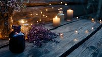 Cozy evening atmosphere with glowing candles, dried flowers and fairy lights on rustic wooden table. Romantic mood with glass jars and purple wildflowers.