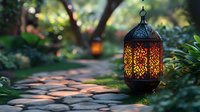 Glowing oriental lantern illuminates garden stone path at dusk, creating magical atmosphere with warm light and decorative patterns through metalwork.