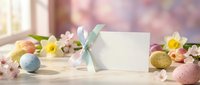 Easter greeting card with pastel eggs, spring flowers and soft ribbon on wooden table with blurred pink bokeh background for holiday celebrations.