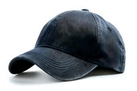 Black cotton baseball cap isolated on white background, showing curved brim and classic structured design for mockup and branding projects.