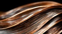 Flowing strands of brown and copper hair with highlights create smooth wavy lines against dark background, showing natural movement and shine in macro view.