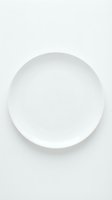 Empty white ceramic plate isolated on white background, ready for food styling, restaurant menus, culinary design, and tableware product presentations.