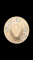 Straw sun hat with delicate floral embroidery isolated on transparent background, ready for t-shirt design, clipart, stickers, and print-on-demand products.