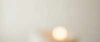 Soft minimalist sun glowing through hazy clouds creating dreamy atmospheric mood for meditation wellness and peaceful morning concepts.